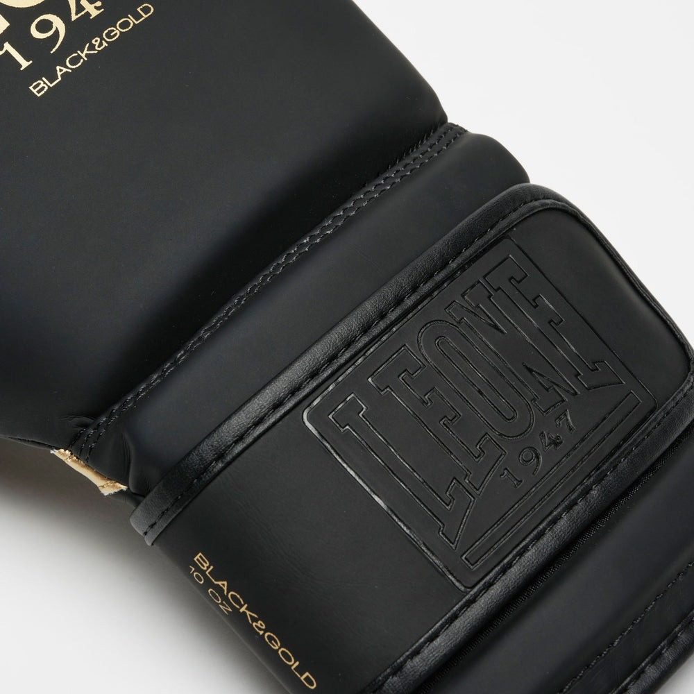 Боксерські рукавиці Leone GN059D Black/Gold 12 унцій (капу в комплекті)
